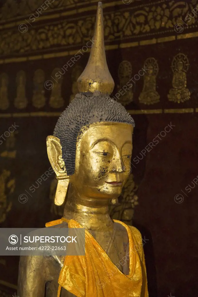 Myanmar, Burma, Kengtung. A ancient wooden statue of Buddha in the Wat In monastery at Kengtung, possibly dating back to the 9th or 10th centuries.