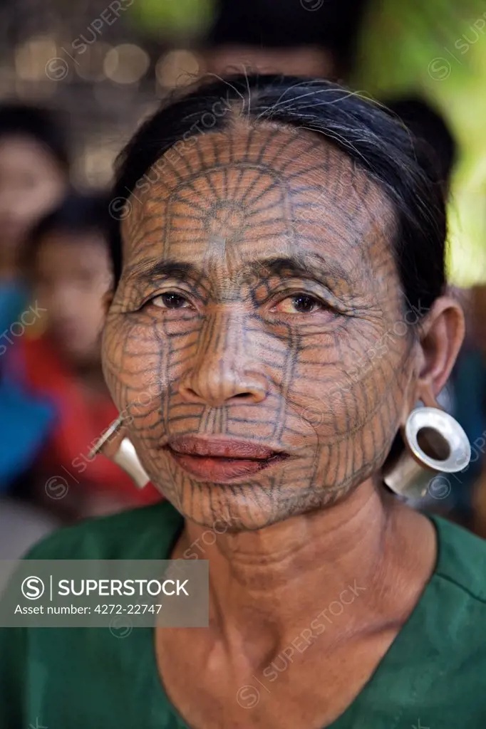 Myanmar, Chin State, Panbaung. A Chin woman with tattooed face. It was customary in the past for girls to be tattooed at 14 or 15 years old, a painful process which took two days.