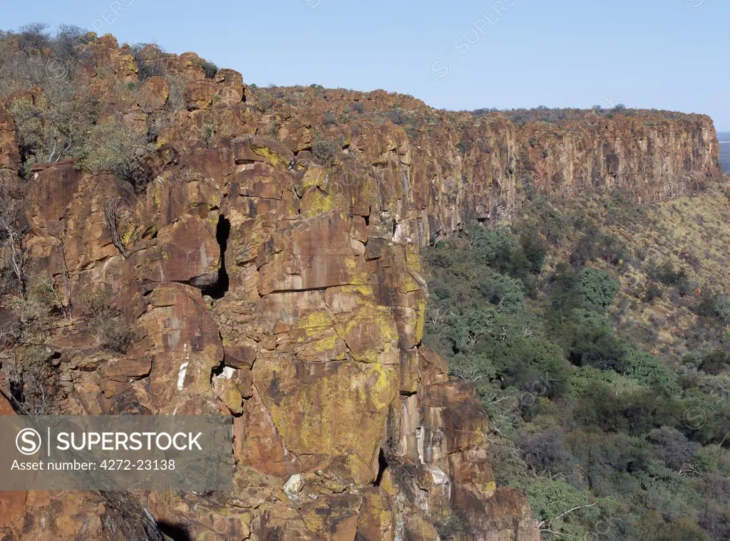 Beautiful red sandstone cliffs surround the isolated Waterberg Plateau, a 50 km long table mountain, which has become a park for rare and threatened species.