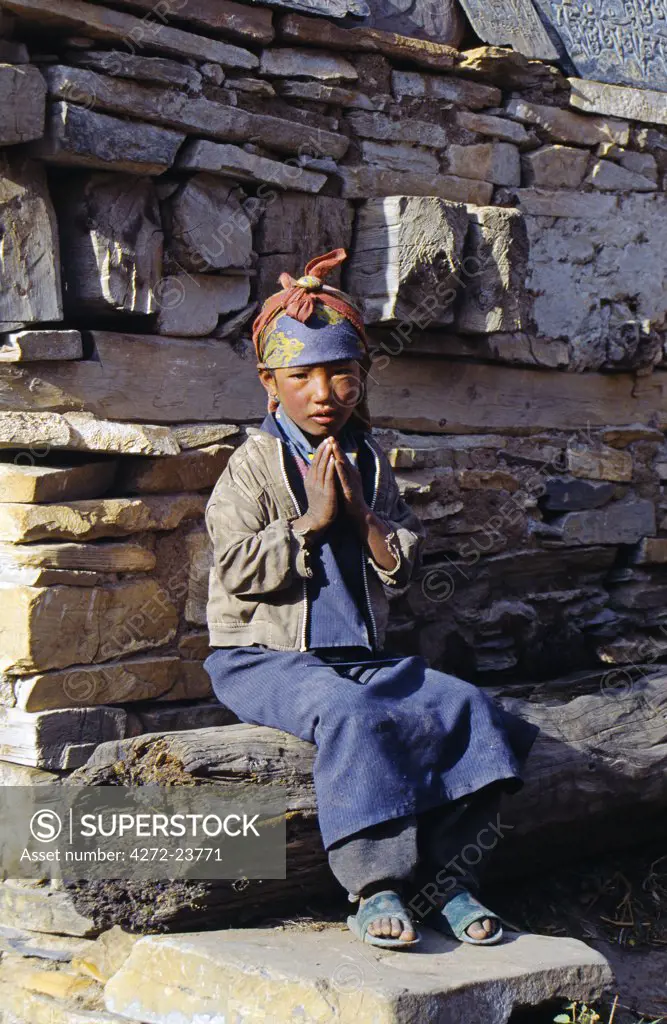 Nepalese girl bidding Namaste (Welcome), Manang