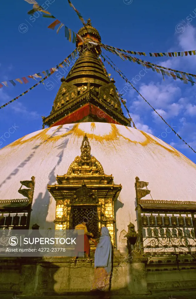 Making an offering, Swayambhunath Stupa, the Monkey Temple