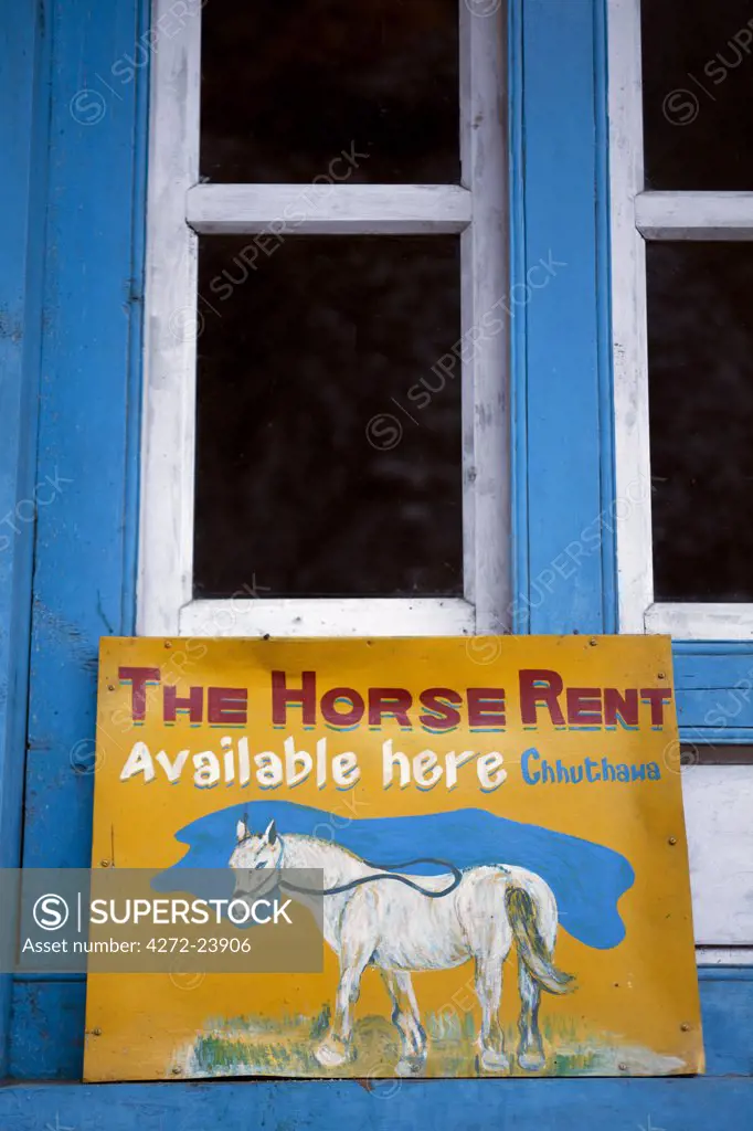 Nepal, Everest Region, Khumbu Valley. Horse rental sign on the Everest Base Camp Trail