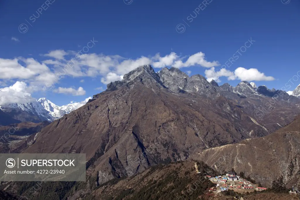 Nepal, Everest Region, Khumbu Valley, Tengboche. The remote Buddhist monastery nestled onto a ridge overshadowed by the Himalayas