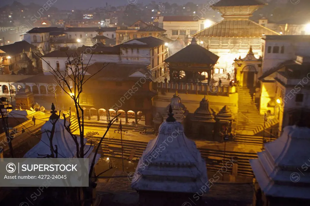 Nepal, Kathmandu, early morning at the Pashupatinath Temple on the banks of the Bagmati River one of the largest Hindu temples in the world