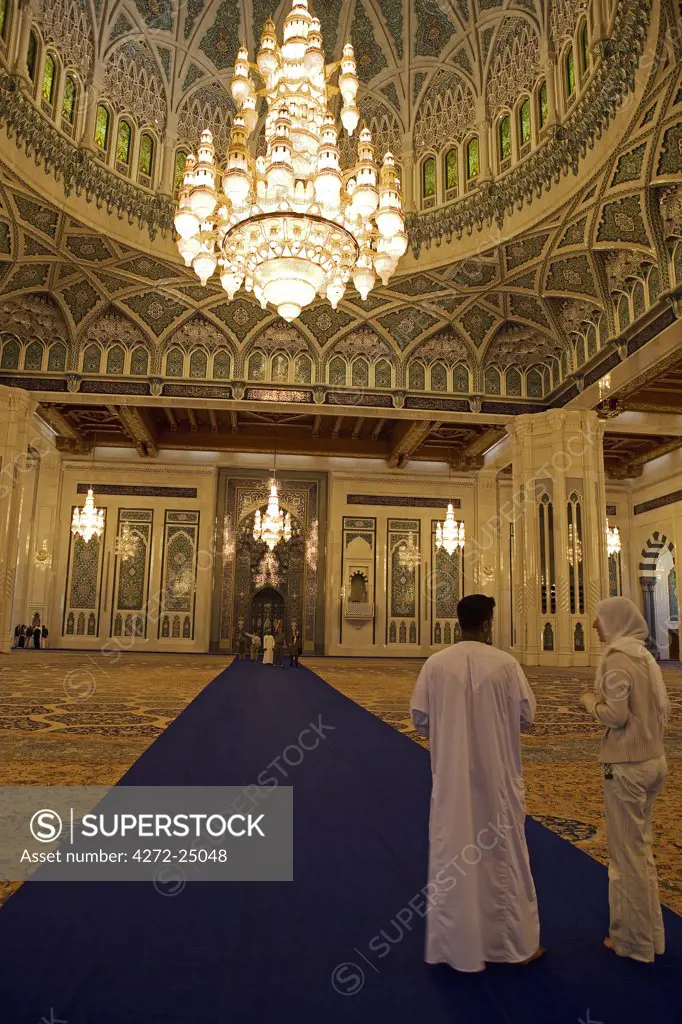 Oman, Muscat, Ghala, Al Ghubrah (Grand Mosque) Mosque. A chandelier in the Main Hall. The mosque is magnificent example of modern islamic architecture was built for the nation by Sultan Qaboos to mark the 30th year of his reign and is open, at certain times, to non-Muslims.
