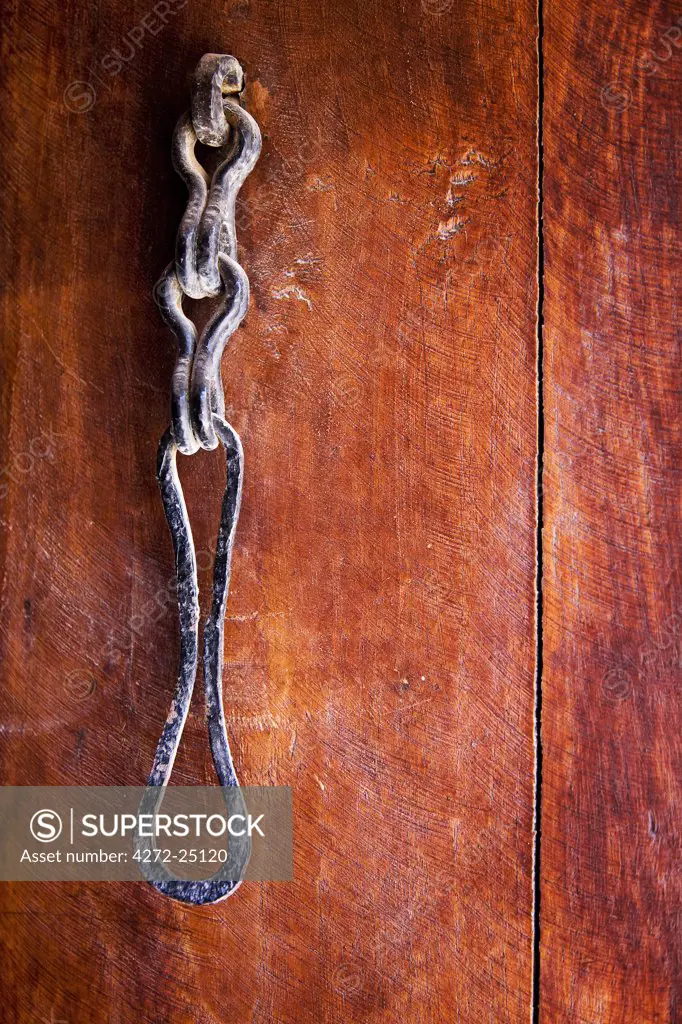 Oman, Nakhl. Door lock detail in the Nakhal Fort.