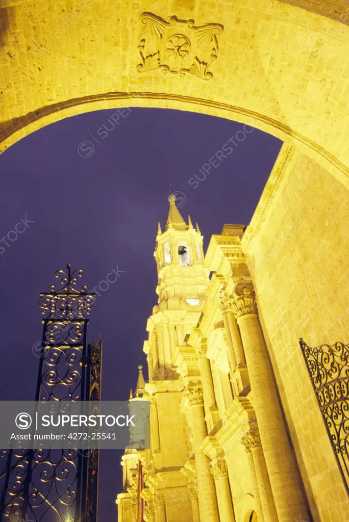 The floodlit exterior of the Cathedral in Arequipa, Peru. The church, on the Plaza de Armas, is constructed of white volanic rock, called sillar.