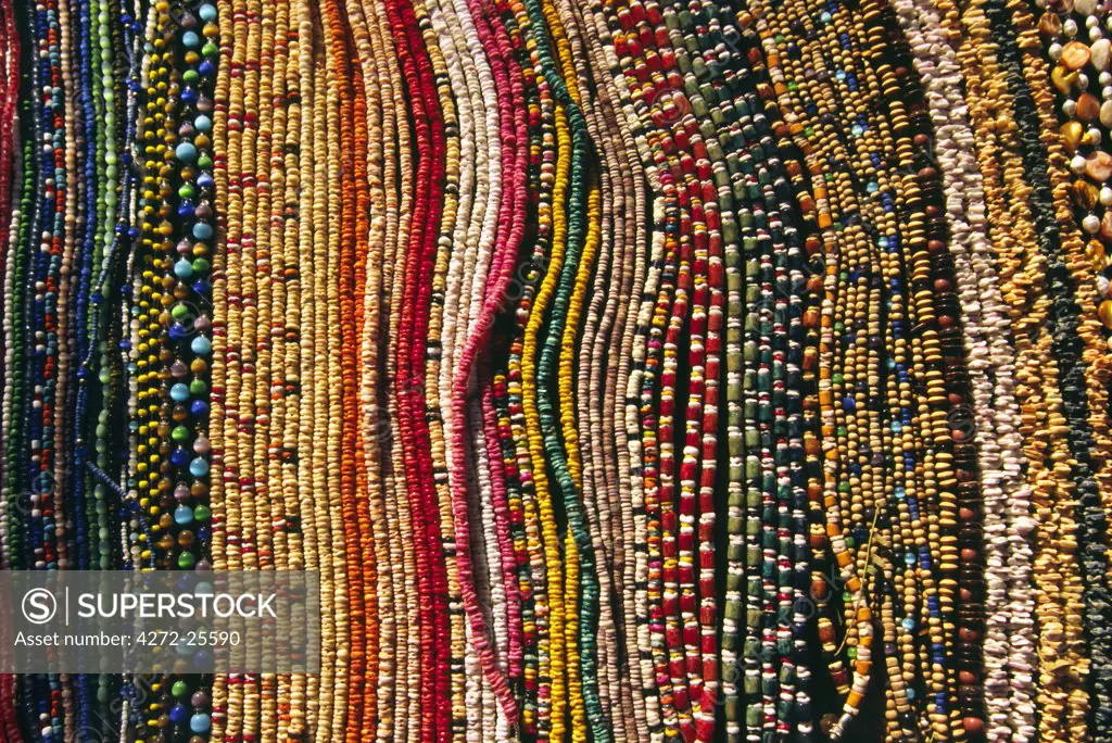 Strings of colourful beads are laid out for sale at the resort town of Mancora in northern Peru.