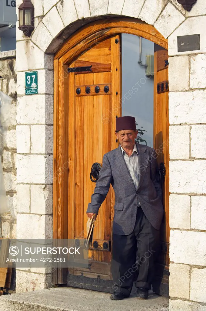 Bascarsija Old Turkish Quarter Man wearing Traditional Turkish Fez Hat