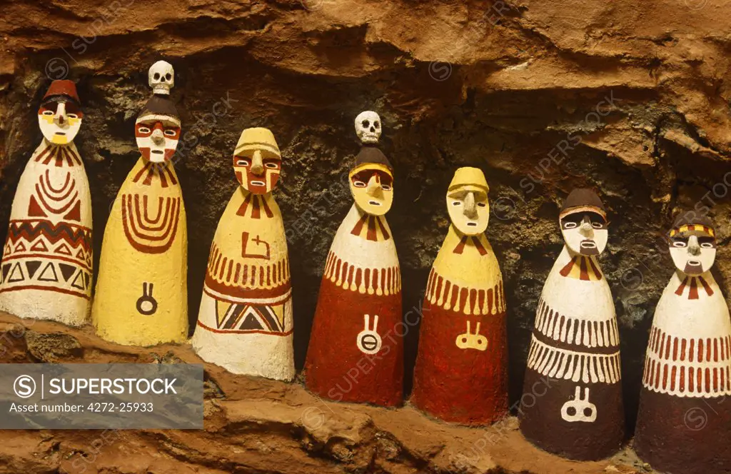 Peru, Amazonas Region, Chachapoyas Province, Leymebamba. At the Centro Mallqui, a museum dedicated to Chacapoyan, or 'People of the Clouds', culture, a model depicts the cliff-hanging sarcophagi which can still be seen at a site called Karajia.