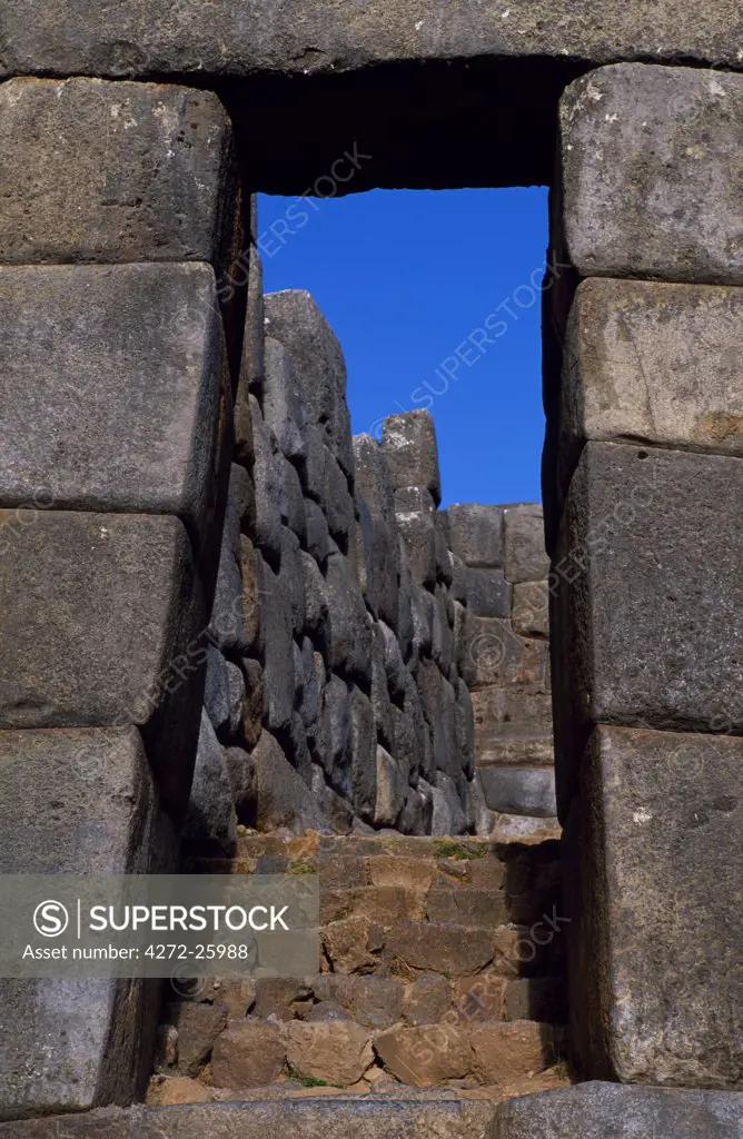 Sacsayhuaman fortress above Cusco is one of the most impressive of all the Inca ruins. The trapezoidal door is classic Inca architecture, built to withstand earthquakes unlike the Spanish arches which frequently tumble down.