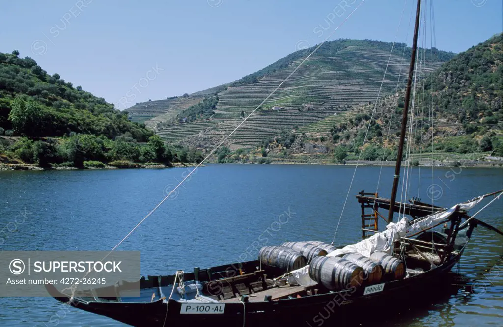A traditional barge used for transporting  barrels of port down the Douro River to Porto