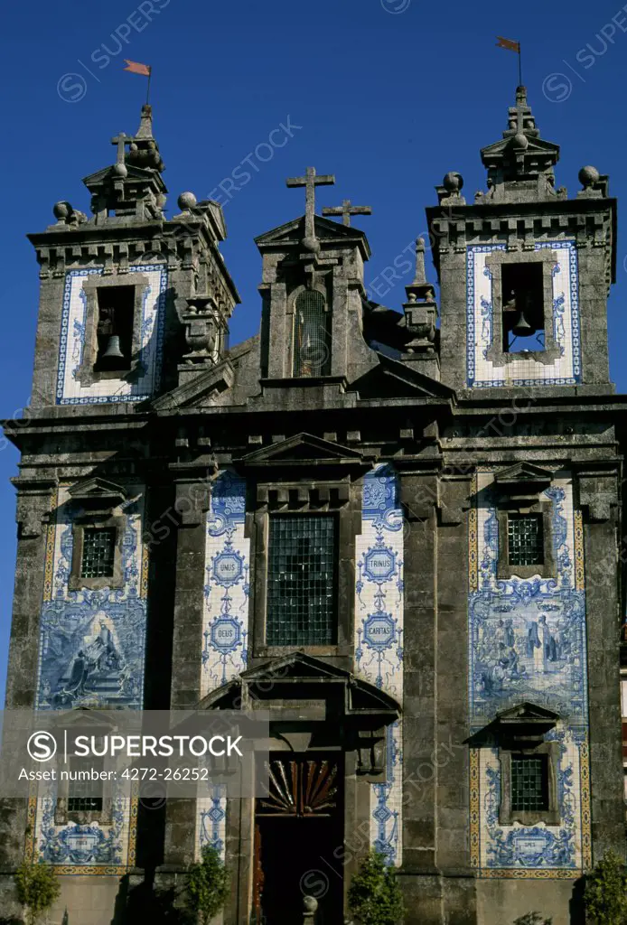 Azulegos, or glazed and painted tiles - almost always blue and white - enliven an otherwise plain church facade.