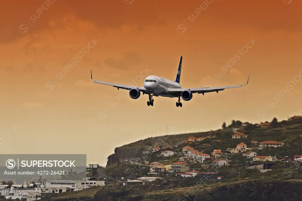 Portugal, Ilha, da Madeira, Funchal, Eiras. Boeing 757-200 of Finnair lands at Funchal Airport