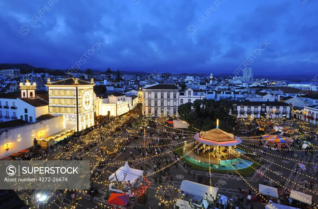 The Holy Christ church and Campo de Sao Francisco during the Holy Christ festivities at Ponta Delgada, in twilight. Sao Miguel, Azores islands, Portugal