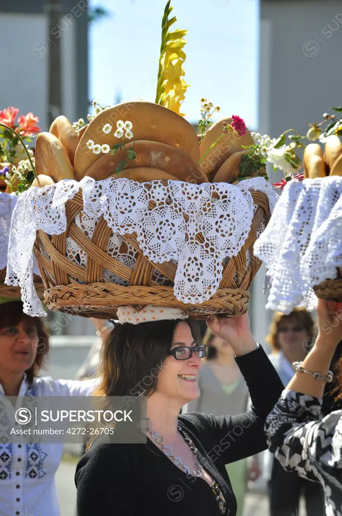 Holy Spirit (Espirito Santo) festivities at Bandeiras. This kind of bread, called Vesperas, is a delicacy. Pico, Azores islands, Portugal