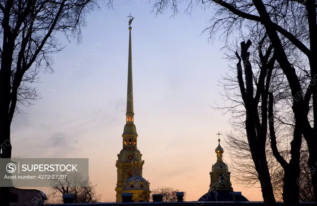 Russia, St.Petersburg; The golden pointed bell tower on the St.Peter's and St.Paul's Cathedral on the Fort dedicated to the saints.