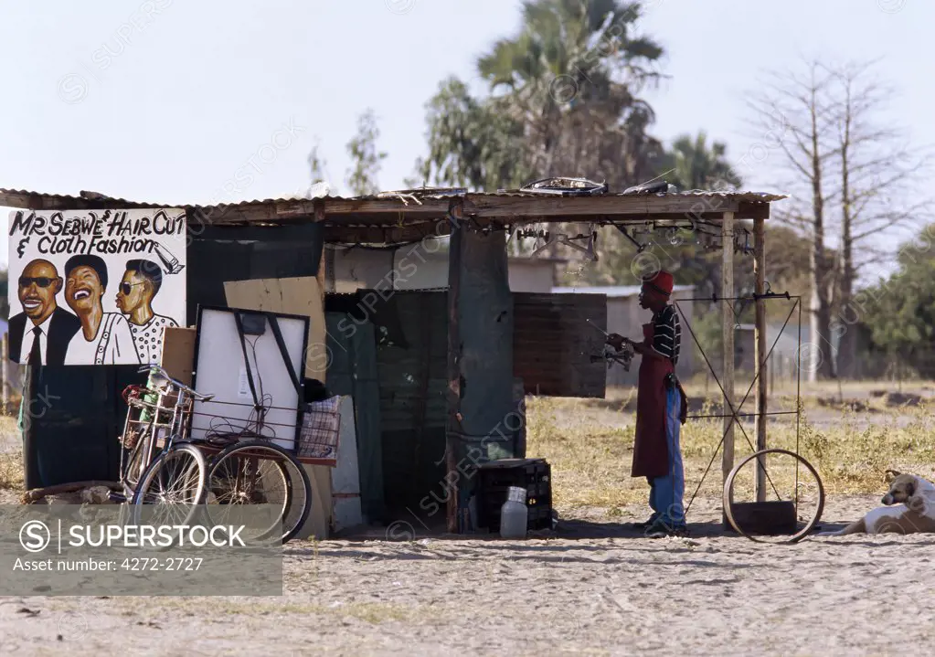 The signs outside a small barber's shop in Maun, the safari capital of Botswana and the gateway to the hugely popular Okavango Delta.