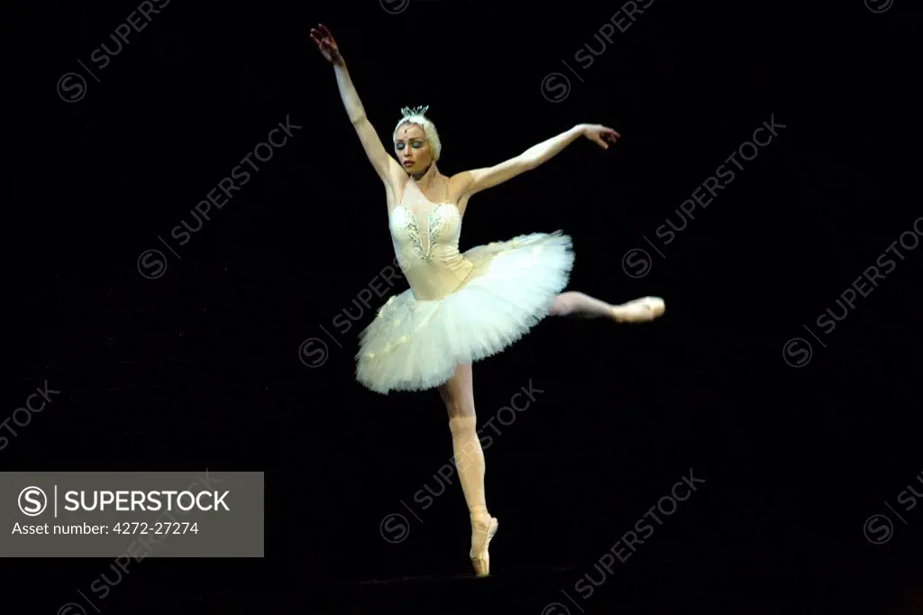 Russia, St.Petersburg; The Prima Ballerina playing the Swan Princess Odette during a solo in Tchaikovsky's 'Swan Lake'