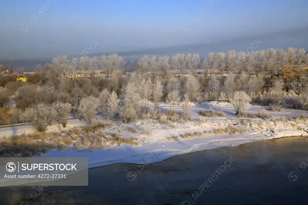 Russia; Siberia; Irkutsk; Frost on trees off the River Angara in the morning