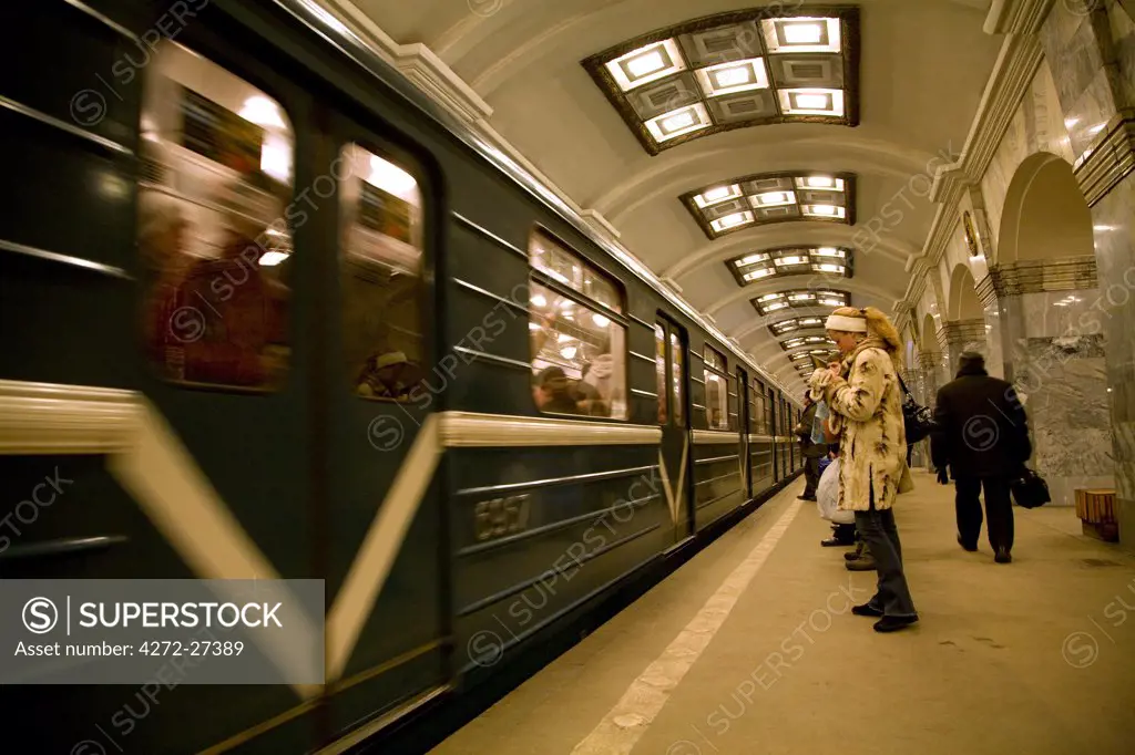 Russia, St. Petersburg; Inside one of the Metro Stations in the city whilst a metro enters