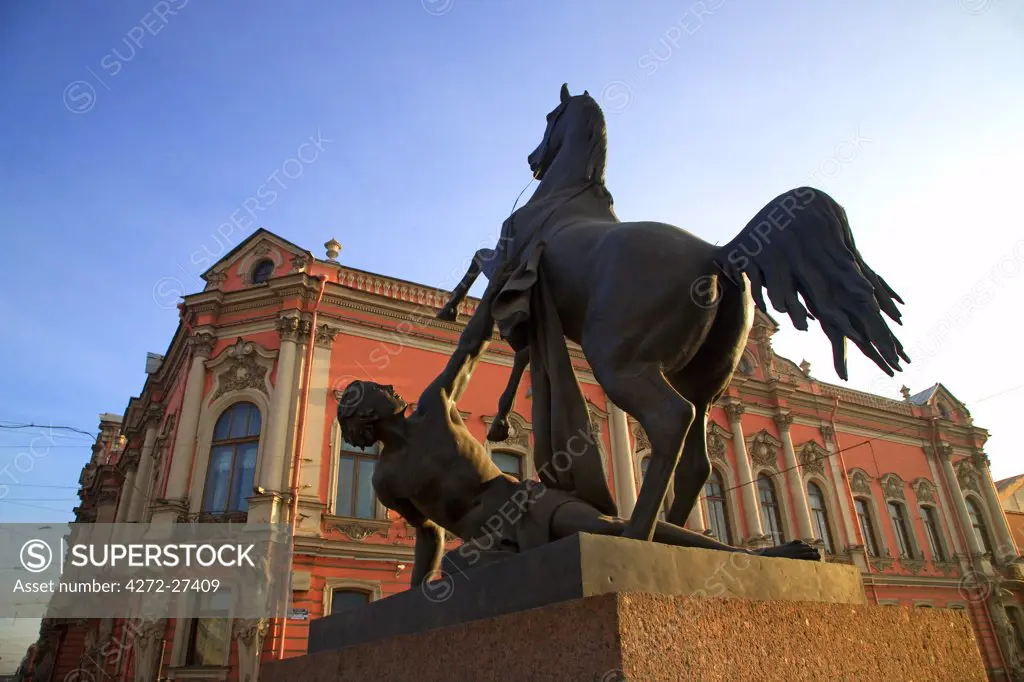 Russia, St. Petersburg; One of the four horse sculptures on the Anitchikov Most on Nevski Prospekt