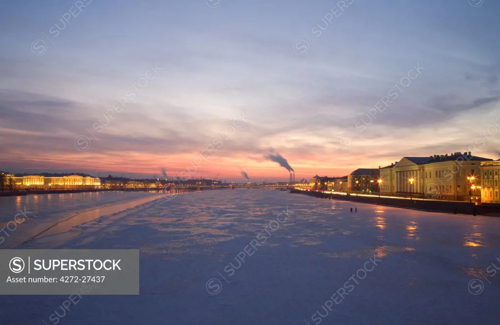 Russia, St. Petersburg; The last light over the partly frozen Neva River with in Winter