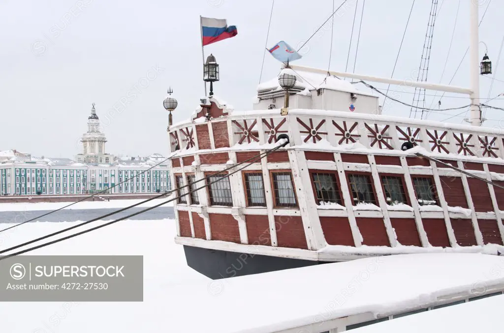Vessel on the Neva River with The Kunstkammer museum in the background, Saint Petersburg, Russia