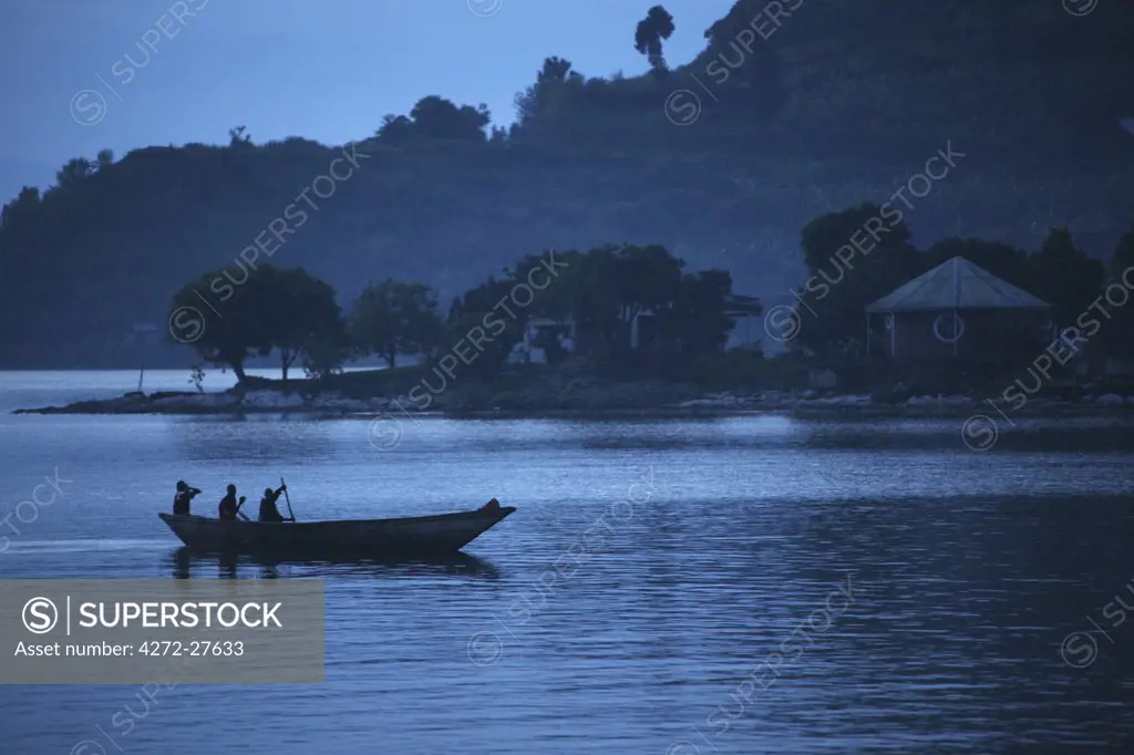 Gisenyi, Rwanda. Night fishermen head out onto Lake Kivu for a long nights work.