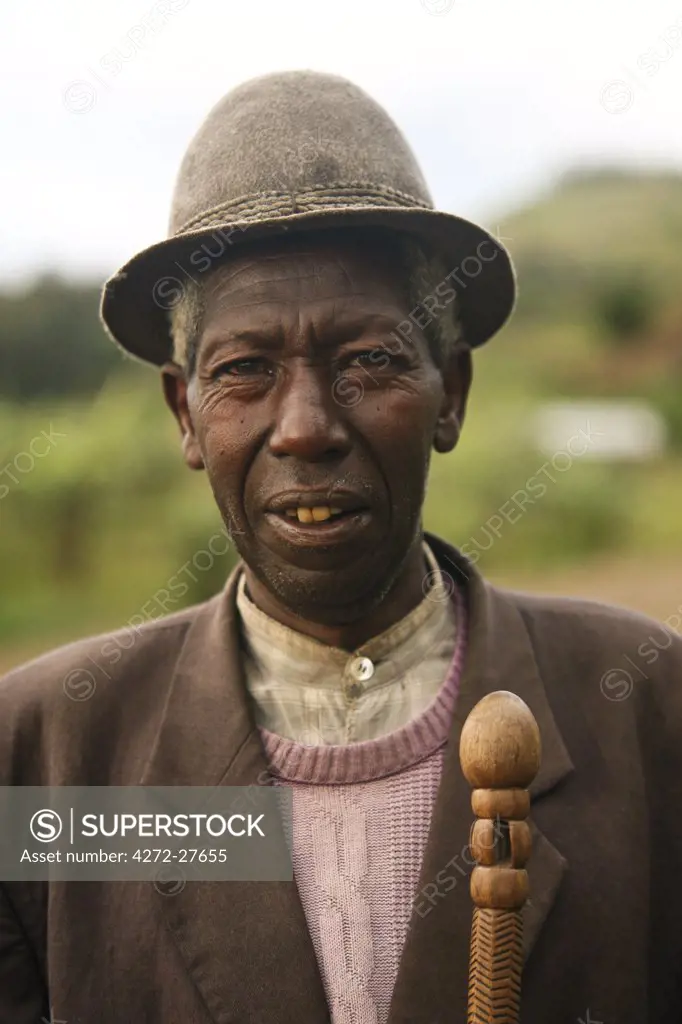 Gisenyi, Rwanda. A local elderly man walks to the market in Gisenyi.