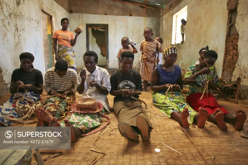 Rwanda. Widows of genocide weave at the Covega Hyacinth weaving cooperative.