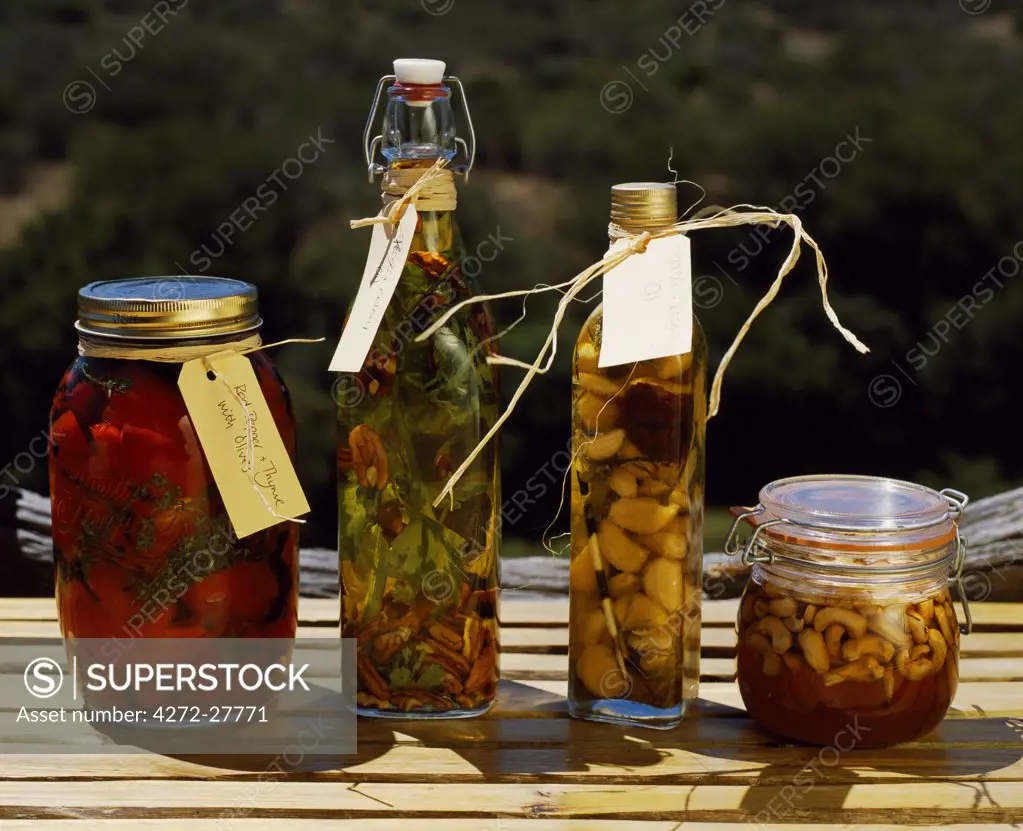 Jars of oils and preserved peppers and nuts at Kwandwe Lodge.