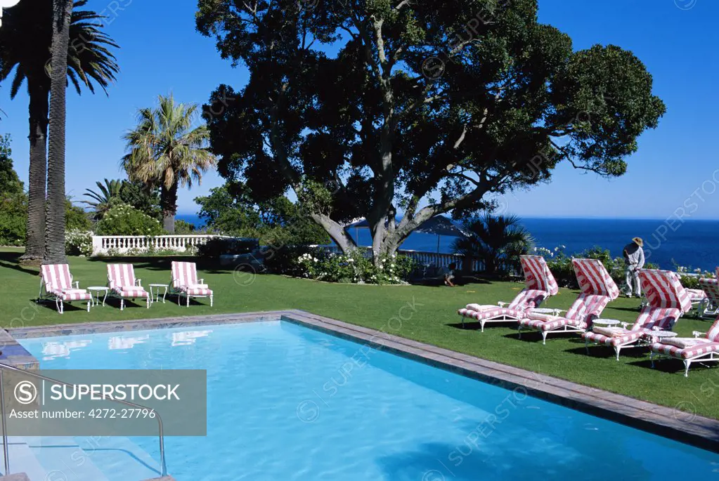 Sun loungers set out round the swimming pool at The Ellerman House hotel