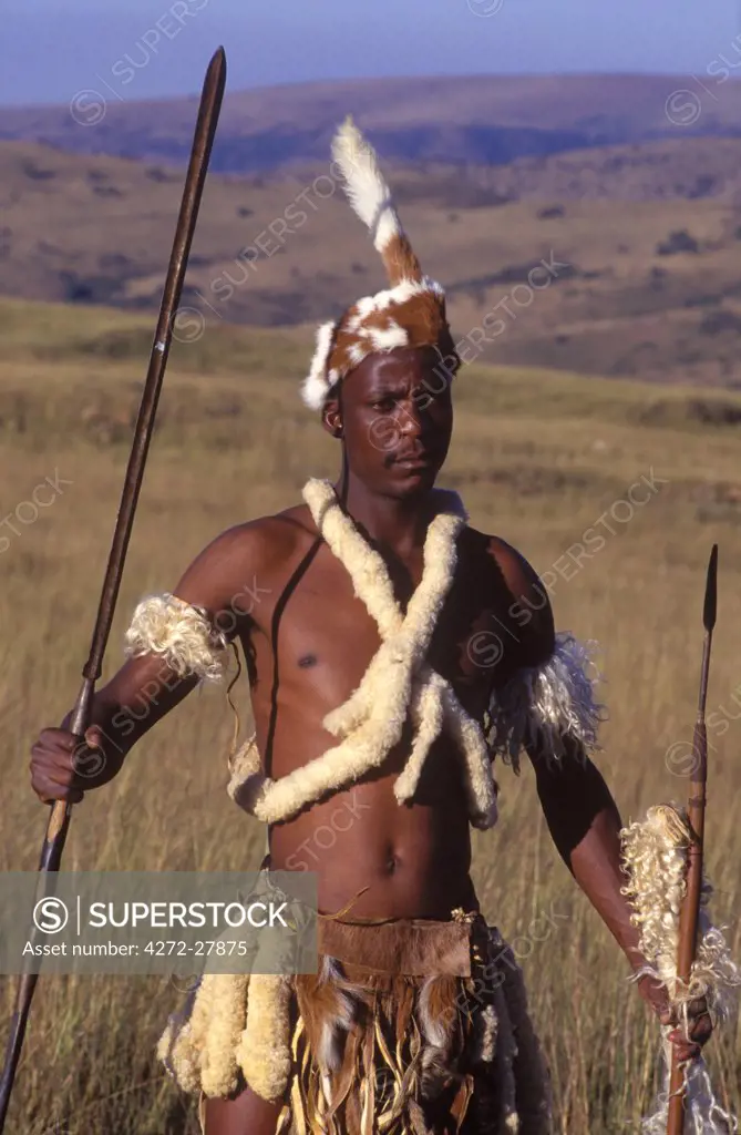 Zulu warrior in traditional dress with fighting spear