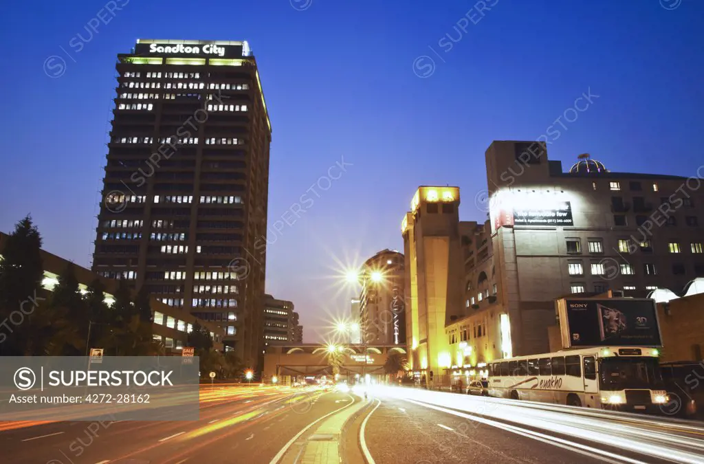 Light trails of traffic passing through downtown Sandton, Johannesburg, Gauteng, South Africa