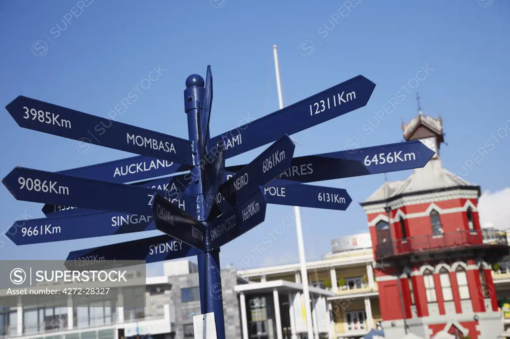 Signpost showing distances to cities at Victoria and Alfred Waterfront, Cape Town, Western Cape, South Africa