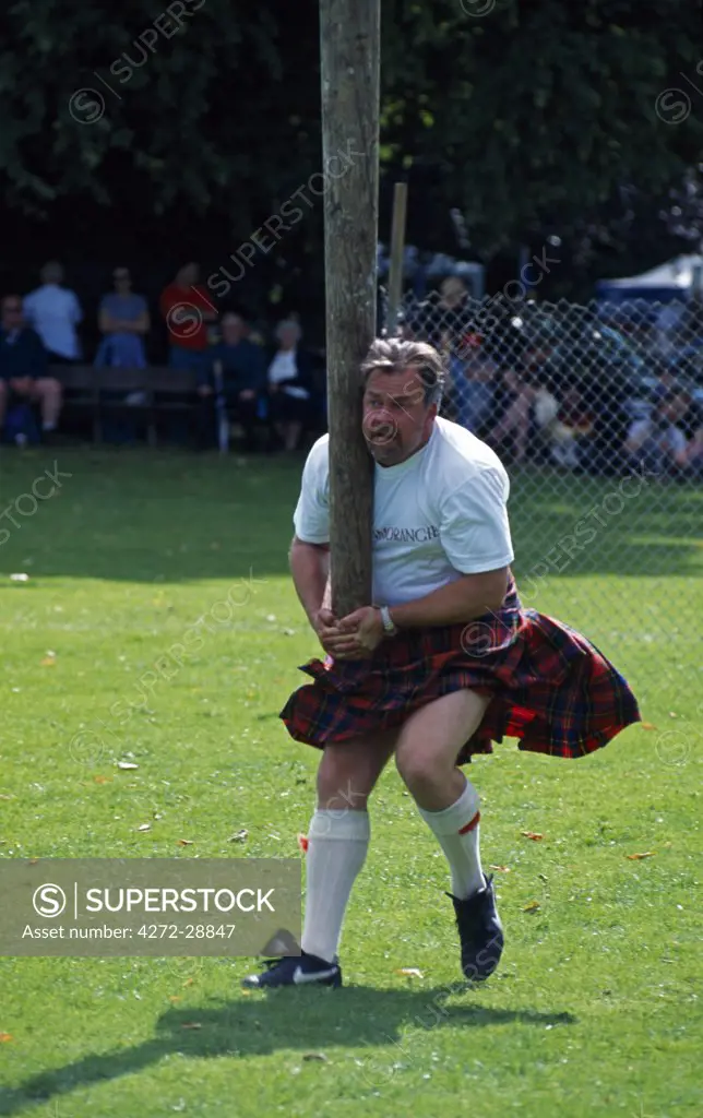 Tossing the caber in the Strathpeffer Games, Scotland