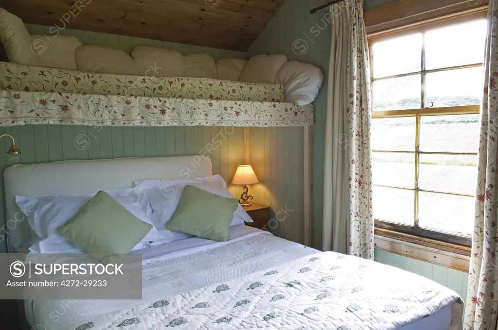 One of the bedrooms at GlenBatrick Lodge.  The lodge overlooks the white sandy shore of Loch Tarbert on the west side of Jura.  Beautifully isolated the lodge is only accessible by boat or a five hour walk.