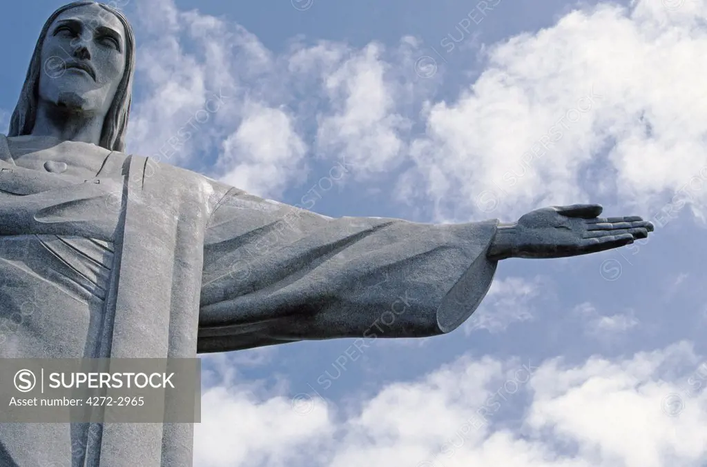 Detail of  Head and hand of Christ the Redeemer Statue tops Corcovado Mountain. The statue built to commemorate Brazil's first 100 years of independence from Portugal.