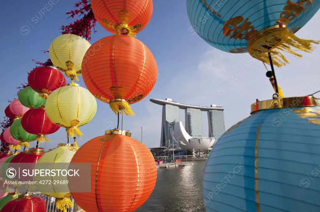 Singapore, Singapore, Marina Bay.  The Marina Bay Sands Hotel viewed through Chinese New Year decorations.