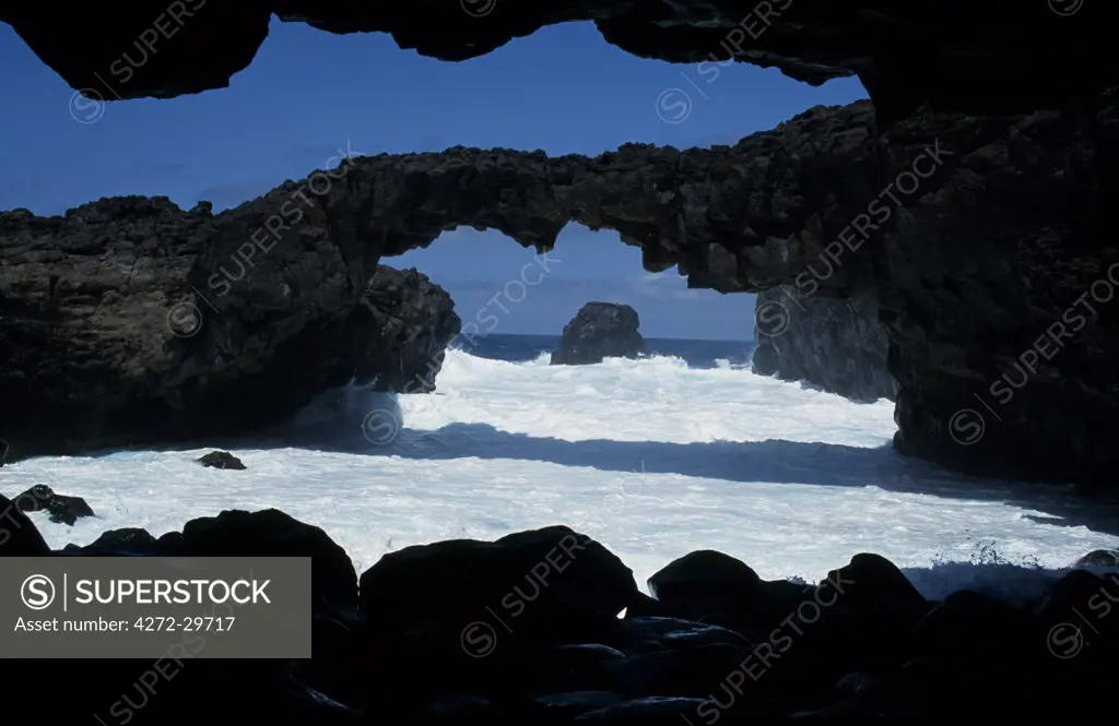 The sea beats against the black volcanic sea cliffs at Las Puntas on the El Golfo coast