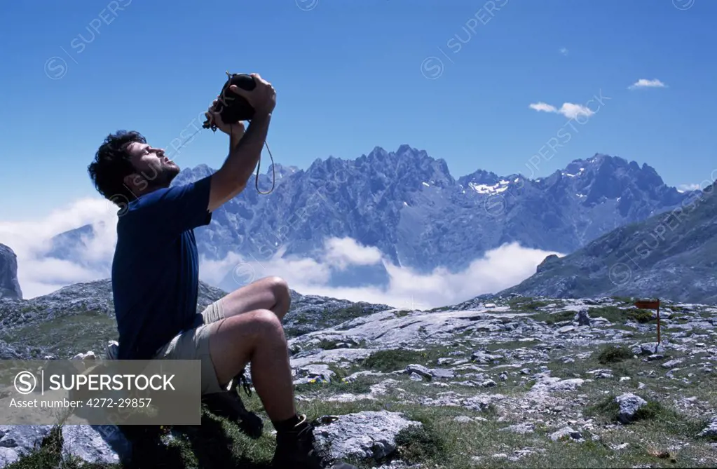 Drinking wine from gourd while on a mountain trek