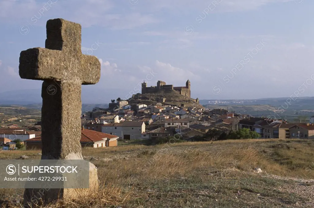 The hilltop village of San Vicente seen from one of the stone crosses that represent the Twelve Stations of the Cross.  San Vicente is known for its guild of flagellants who process along the stations of the cross whipping themselves in penance as they go.