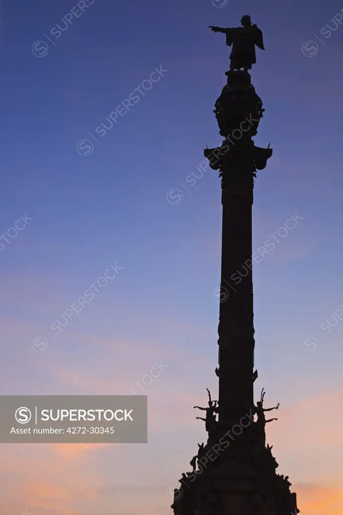 Spain, Cataluna, Barcelona, Ciutat Vella, the Colum statue in honour of Christopher Columbus at sunset.