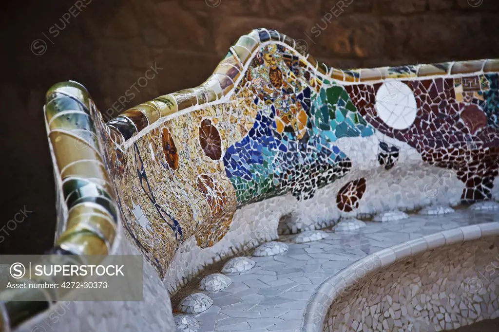 Spain, Cataluna, Barcelona, El Coll, Tiling bench detail in Parc Guell designed by the architect Antoni Gaudi.