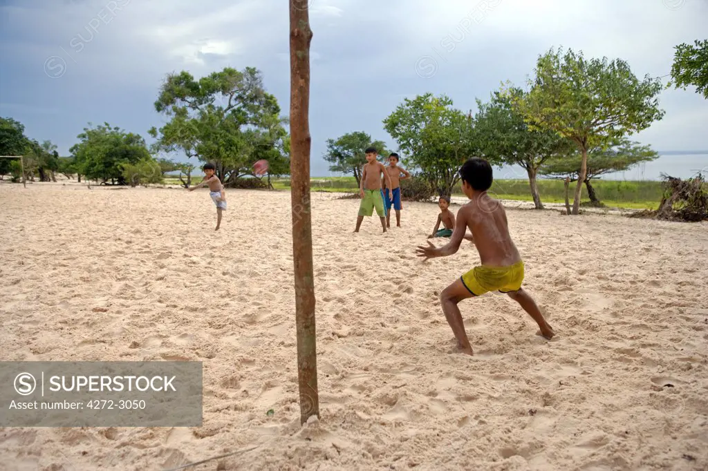 Football game in action at the village of Jamaraqua on the banks of the Rio Tapajos
