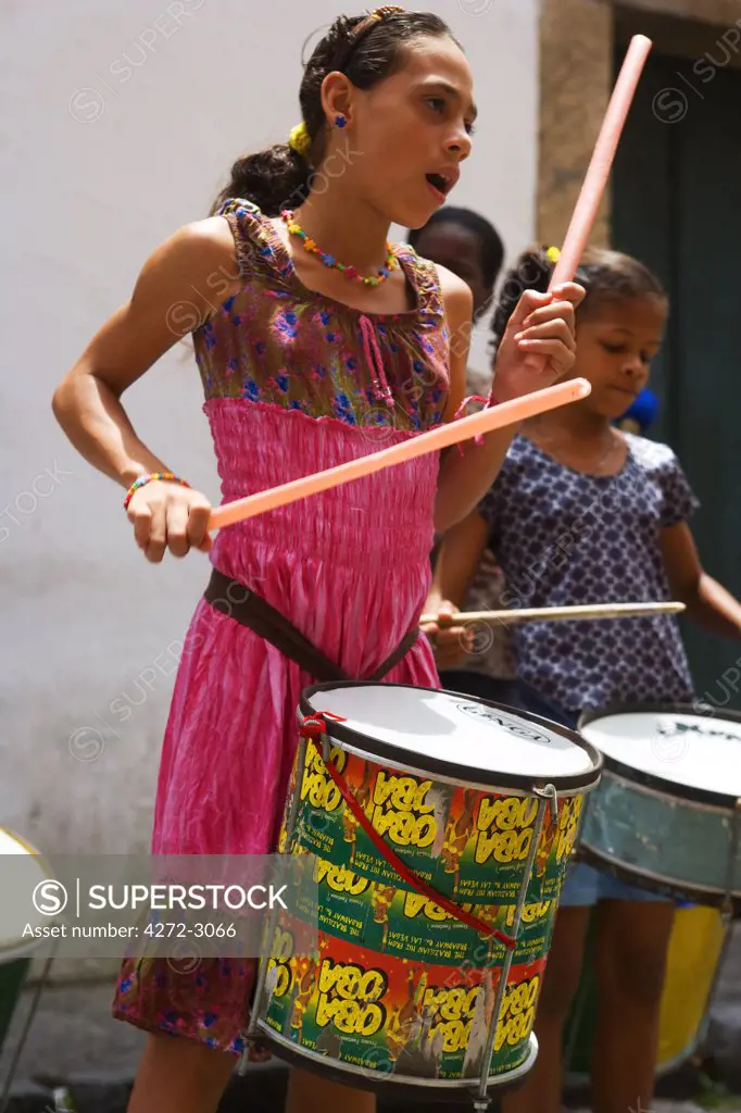 Young muscians play on the streets of the UNESCO city of Salvador da Bahia, North East Brazil