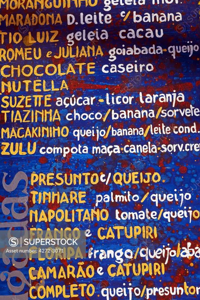 Cafe menu board on the island of Morro de Sao Paulo on the north east Atlantic coastline of the Bahia Region of Brazil