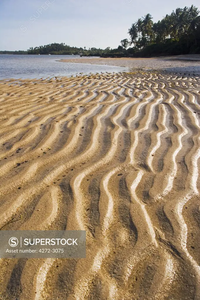 Low tide exposes wave sculpted patterns in the sand on the Tinhare archipelago, north east Bahia region of Brazil