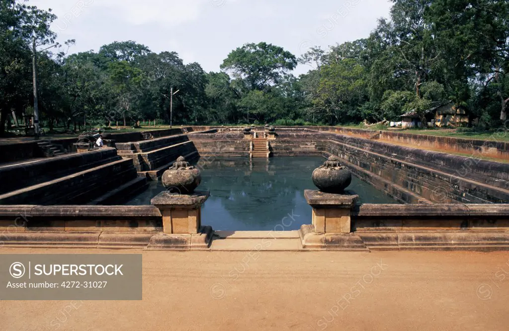 Sri Lanka, ancient city Auradhapura, Bhikku bathing pool (9th century).  Auradhapura was the capital of Sri Lanka (on and off) for over 1000 years (until the 10-11th century.  While houses and such no longer remain, ancient palaces litter the area. The ancient city Auradhapura was established around the 5th century BC.